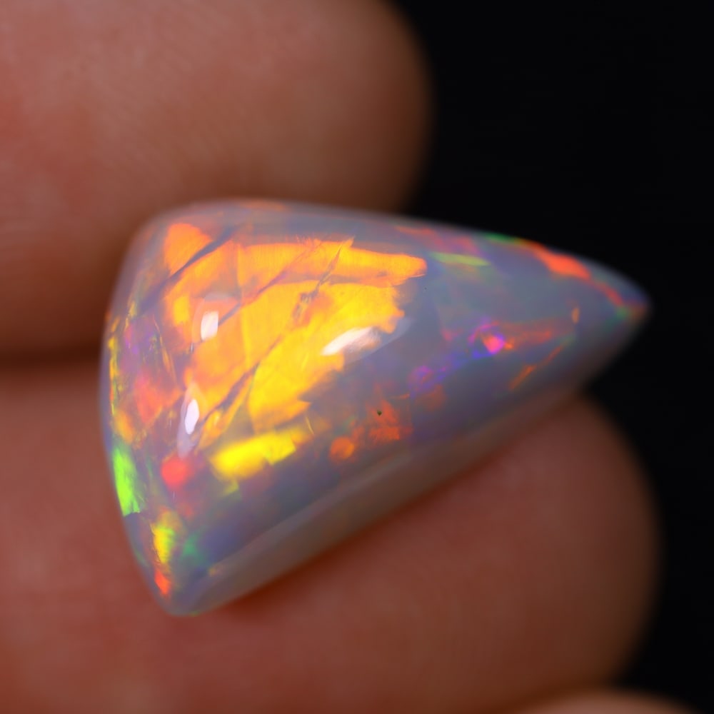 *8.19Ct Welo Opal Polished - Ethiopian Opal, 813B: Ksmith Heritage Auctioneers Welcome to our auction house, today auction brought to you by Ksmith Heritage Auctioneers based in Penang, Malaysia specialize in all kinds of opal and color gemstone both
