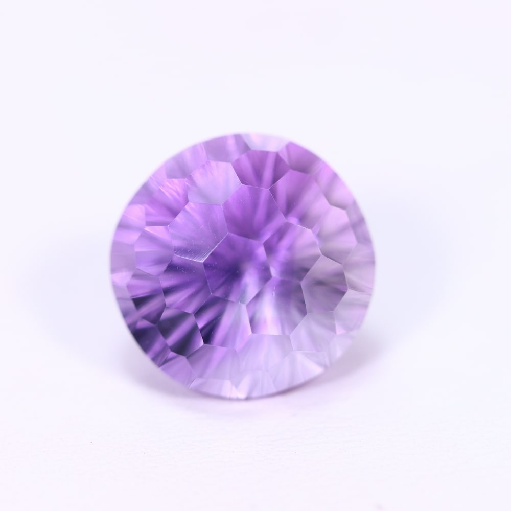 10.96Ct Purple Amethyst - Polished Faceted, 410B: Ksmith Heritage Auctioneers Welcome to our auction house, today auction brought to you by Ksmith Heritage Auctioneers based in Penang, Malaysia specialize in all kinds of opal and color gemstone both