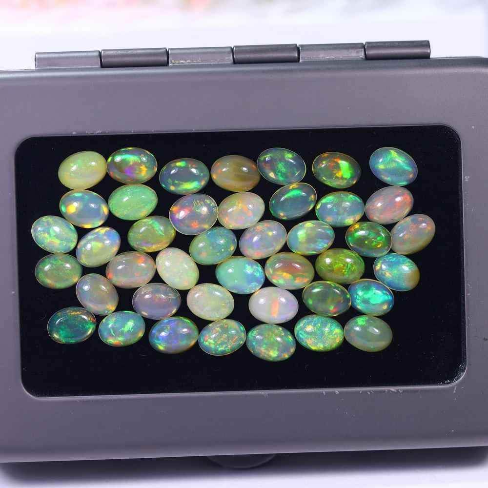 *21.54Ct Calibrated 7x5mm Welo Opal Set - Ethiopian Opal, 1155B: Ksmith Heritage Auctioneers Welcome to our auction house, today auction brought to you by Ksmith Heritage Auctioneers based in Penang, Malaysia specialize in all kinds of opal and color gemstone both
