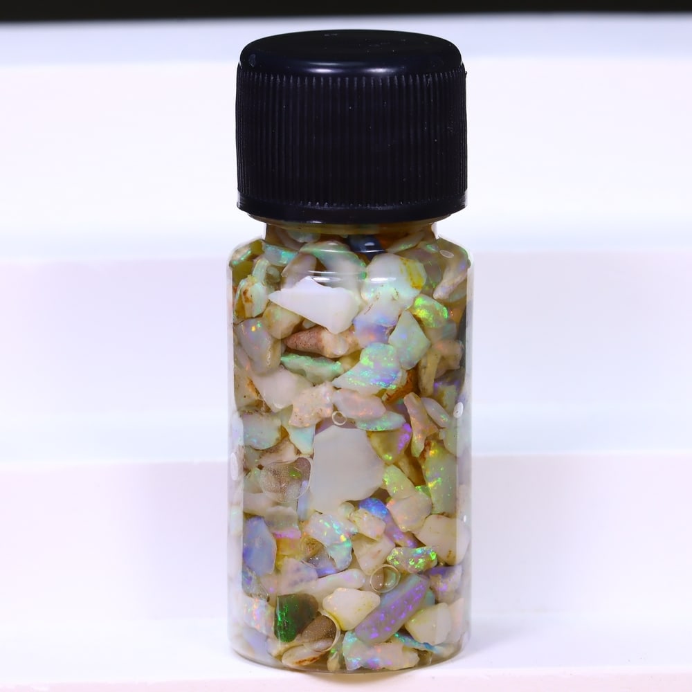 Australian Lightning Ridge Crystal Black Opal Rough Chip Jar (Good For Display), 439B: Ksmith Heritage Auctioneers Subject: Natural Australian Opal Origin: Australia Quantity: 1 Jar as photo