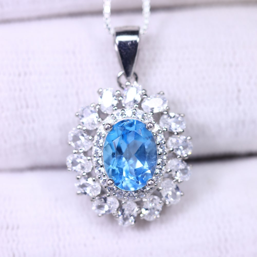 18inches Necklace Swiss Blue Topaz - 925 Sterling Silver , 120B: Ksmith Heritage Auctioneers Subject: Natural Swiss Blue Topaz & Simulated CZ Origin: Thailand Carat Weight: 3.45g Dimension: Gemstone 6x8mm Type: Necklace