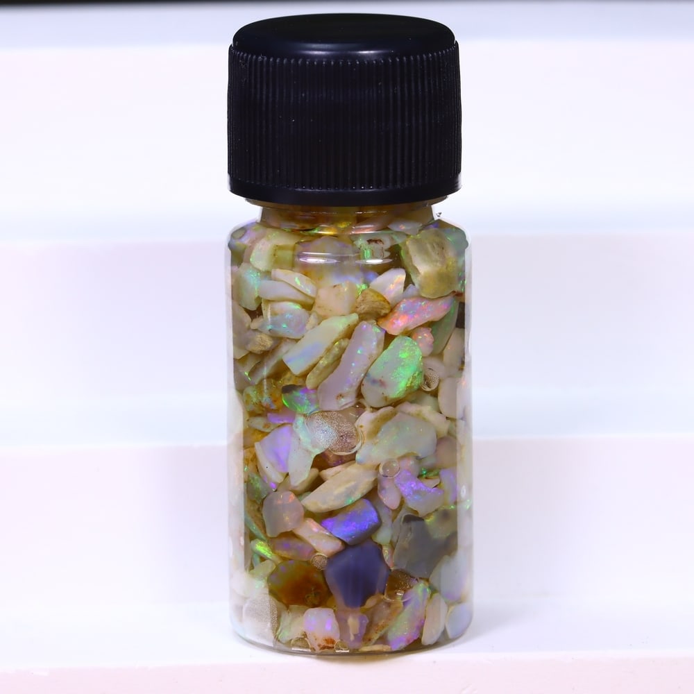 Australian Lightning Ridge Crystal Black Opal Rough Chip Jar (Good For Display), 147B: Ksmith Heritage Auctioneers Subject: Natural Australian Opal Origin: Australia Quantity: 1 Jar as photo