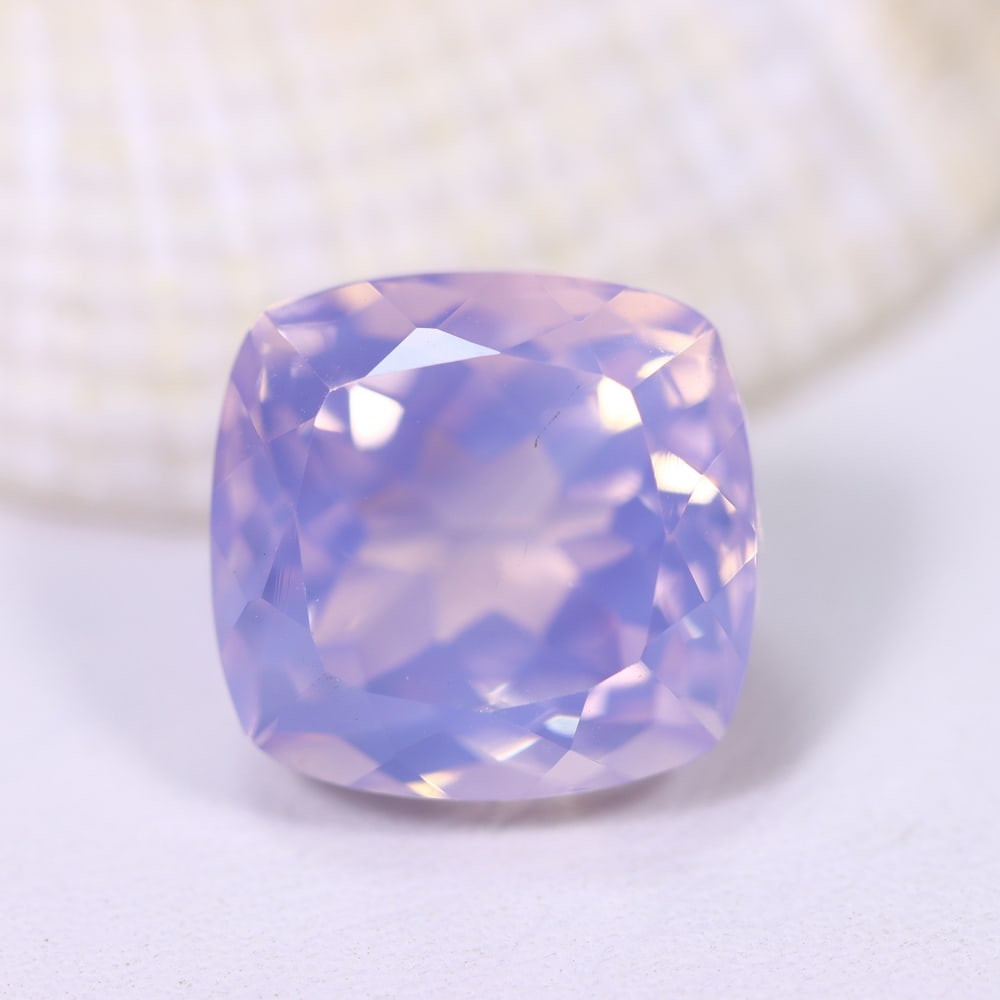 9.11Ct Lavender Amethyst - Polished Faceted , 965E: Ksmith Heritage Auctioneers Subject: Natural Lavender Amethyst Origin: Brazil Carat Weight: 9.11Ct Dimension: 12.6x12.1x9.3 mm Treatment: Untreated Type: Faceted, Polished