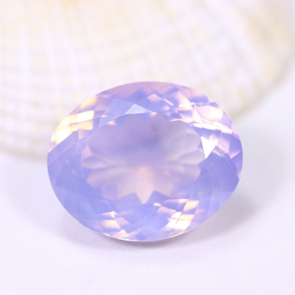 12.61Ct Lavender Amethyst - Polished Faceted , 1042E: Ksmith Heritage Auctioneers Subject: Natural Lavender Amethyst Origin: Brazil Carat Weight: 12.61Ct Dimension: 17x14x9.2 mm Treatment: Untreated Type: Faceted, Polished