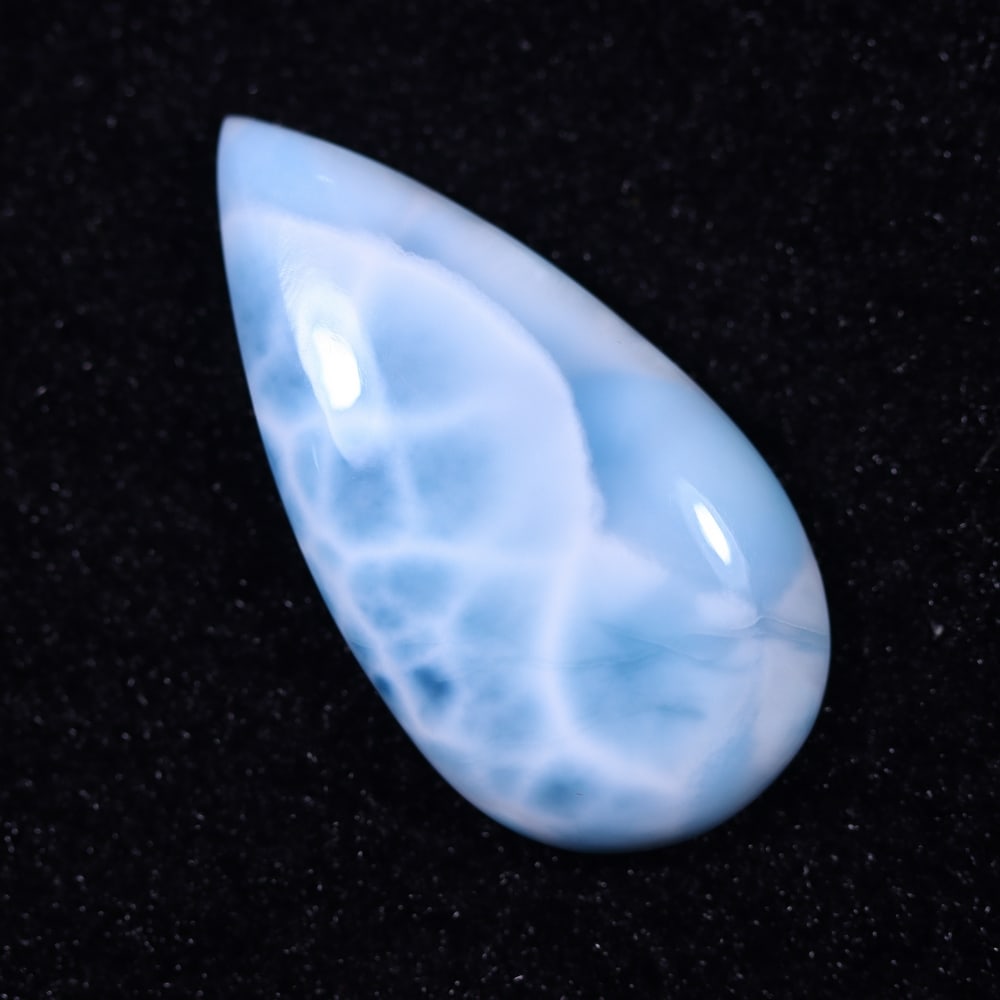 *28.61cts Natural Larimar - Polished Cabochon , 1128E: Ksmith Heritage Auctioneers Subject: Natural Larimar Carat Weight: 28.61 cts Dimension: 33.4x17.3x6.3 mm Type: Cabochon, Polished