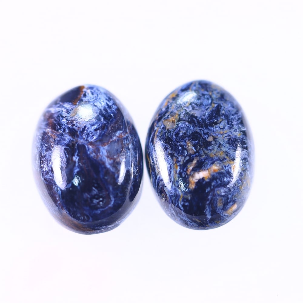 9.37Ct Pietersite Cabochon Pair - Gemstone Crystal - Oval Cabochon, 186B: Ksmith Heritage Auctioneers Subject: Natural Pietersite Origin: Namibia, South Africa Carat Weight: 9.37Ct Dimension: 13.9 x 10.2 x 4.4 mm Treatment: Natural Untreated Shape: O