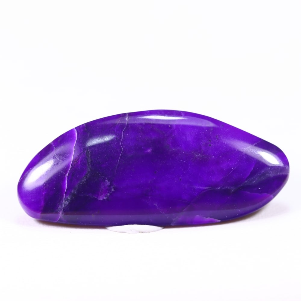 13.47cts Natural Rare Purple Sugilite Cabochon - No treated , 994E: Ksmith Heritage Auctioneers Subject: Natural Sugilite Origin: South Africa Carat Weight: 13.47Ct Dimension: 31.2x13.3x3.7 mm Treatment: No Treatment Type: Cabochon, Polish