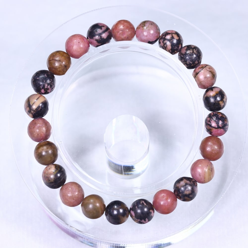 23.51g Rhodonite Bracelet - Polished Beads , 1162E: Ksmith Heritage Auctioneers Subject: Natural Rhodonite Carat Weight: 23.51g