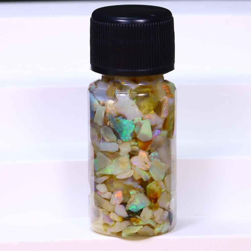 Australian Lightning Ridge Crystal Black Opal Rough Chip Jar (Good For Display), 107B: Ksmith Heritage Auctioneers Subject: Natural Australian Opal Origin: Australia Quantity: 1 Jar as photo