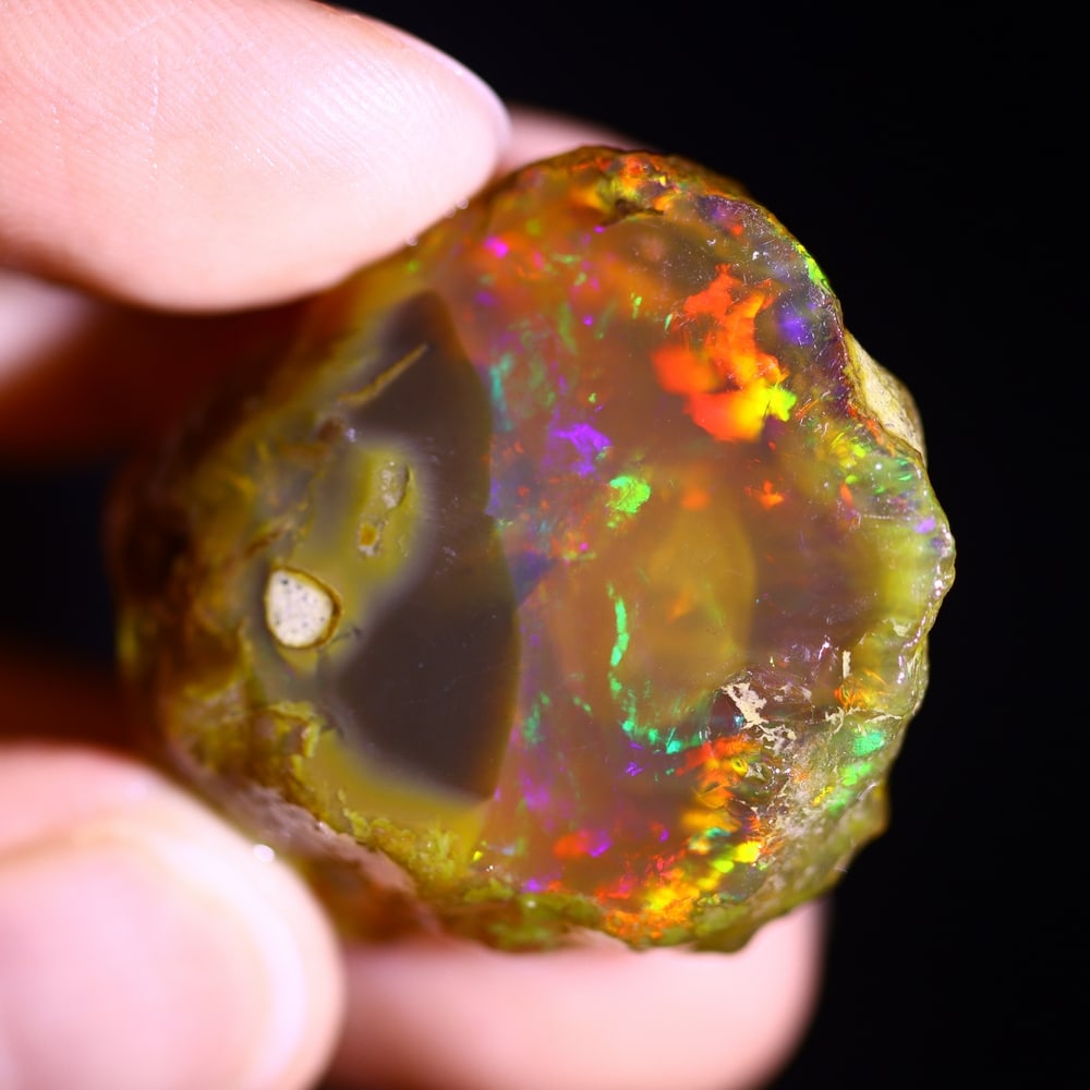 84.2cts Rainbow Phantom Egg Ethiopian Crystal Specimen Rough , 1019E: Ksmith Heritage Auctioneers Subject: Natural Ethiopian Crystal Rough Origin: Ethiopia Carat Weight: 84.2 cts Dimension: 34x28x17 mm Treatment: Unheated Type: Rough Specime