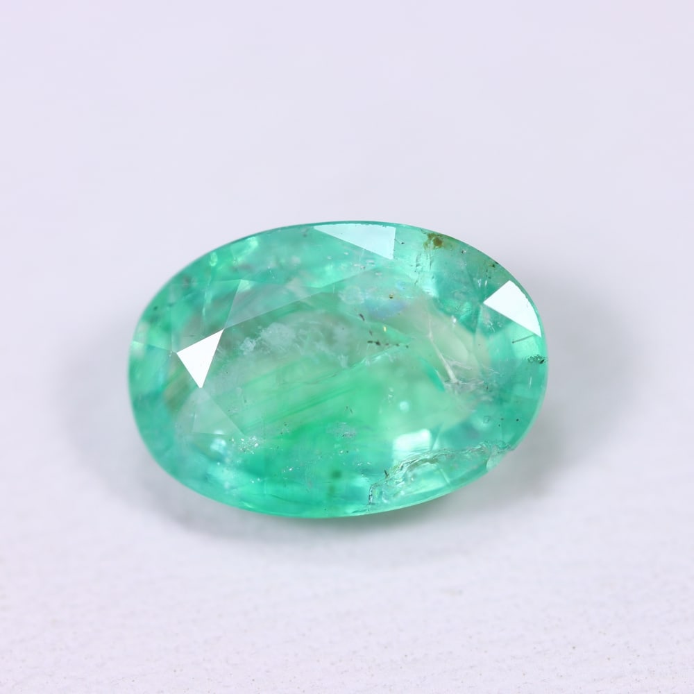 2.50Ct Zambian Emerald - Polished Faceted - Oval Faceted, 469B: Ksmith Heritage Auctioneers Subject: Natural Zambian Emerald Origin: Zambia Carat Weight: 2.50Ct Dimension: 10.6x7.4x4.4 mm Treatment: Oiled Shape: Oval Type: Facete