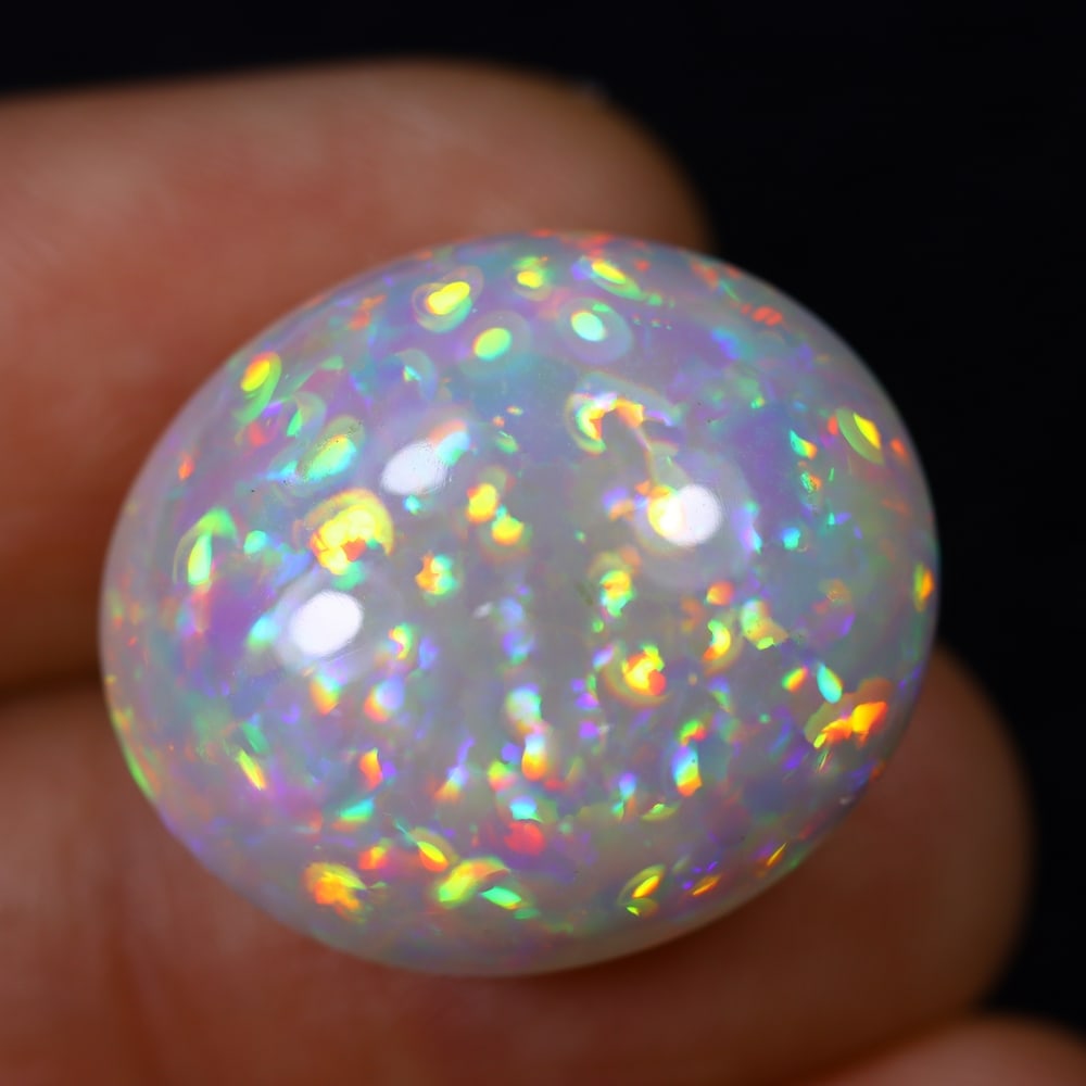 *19.88Ct Welo Opal Polished - Ethiopian Opal , 156E: Ksmith Heritage Auctioneers Subject: Natural Ethiopian Welo Opal Origin: Ethiopia Carat Weight: 19.88Ct Dimension: 21.1x18.3x10.9 mm Treatment: Natural Untreated Type: Cab