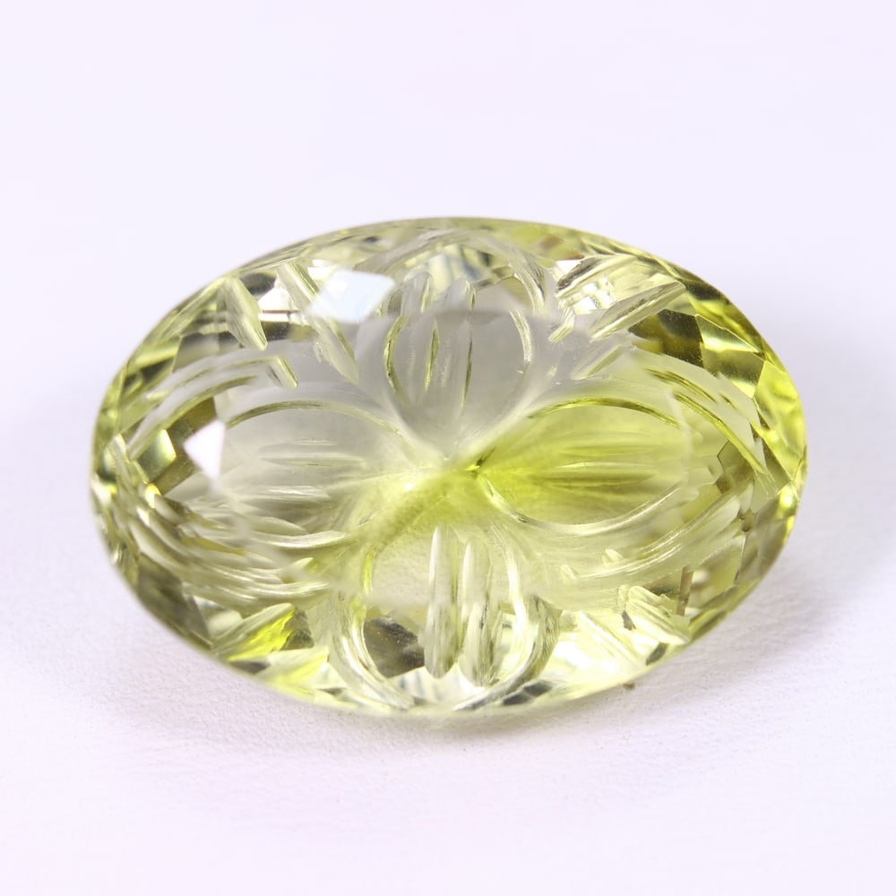 34.34Ct Lemon Carving Quartz - Polished Carving , 174E: Ksmith Heritage Auctioneers Subject: Natural Lemon Quartz Origin: Brazil Carat Weight: 34.34Ct Dimension: 25.9x18x11.5 mm Treatment: Untreated Type: Carving, Polished <