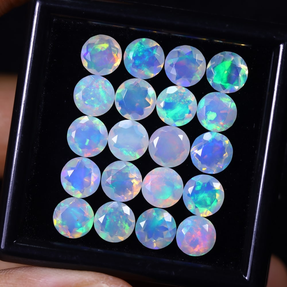 *11.33Ct 20pcs Calibrated 6x6mm Faceted Welo Opal Set - Ethiopian Opal, 282B: Ksmith Heritage Auctioneers Subject: Natural Ethiopian Welo Opal Origin: Ethiopia Carat Weight: 11.33Ct Treatment: Natural Untreated Type: Faceted, Polished