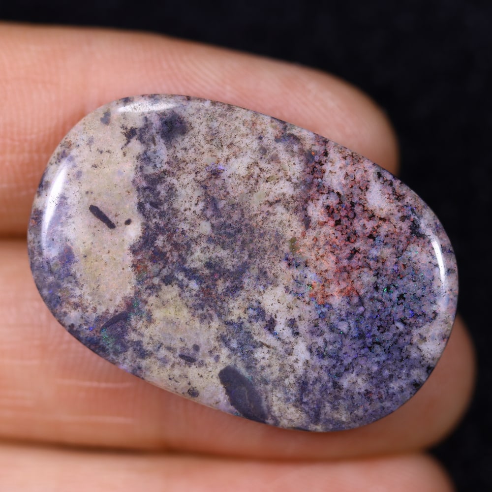 23.52Ct Andamooka Opal - Australian Opal, 366B: Ksmith Heritage Auctioneers Subject: Natural Andamooka Opal Origin: Australia Carat Weight: 23.52Ct Dimension: 32x21.6x4.3 mm Treatment: Sugar Treated Type: Cabochon, Polished<