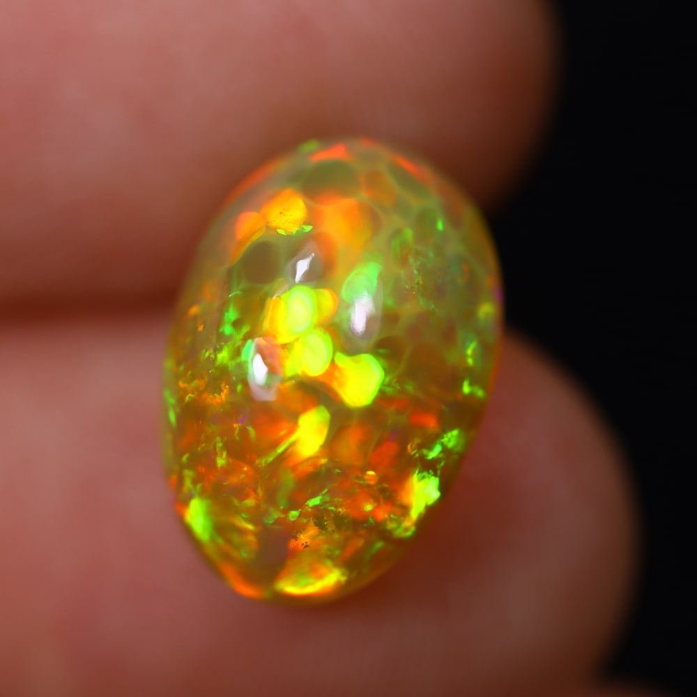 *4.45Ct Welo Opal Polished - Ethiopian Opal, 514B: Ksmith Heritage Auctioneers Subject: Natural Ethiopian Welo Opal Origin: Ethiopia Carat Weight: 4.45Ct Dimension: 13.9x9.4x6.9 mm Treatment: Natural Untreated Type: Cabochon, P