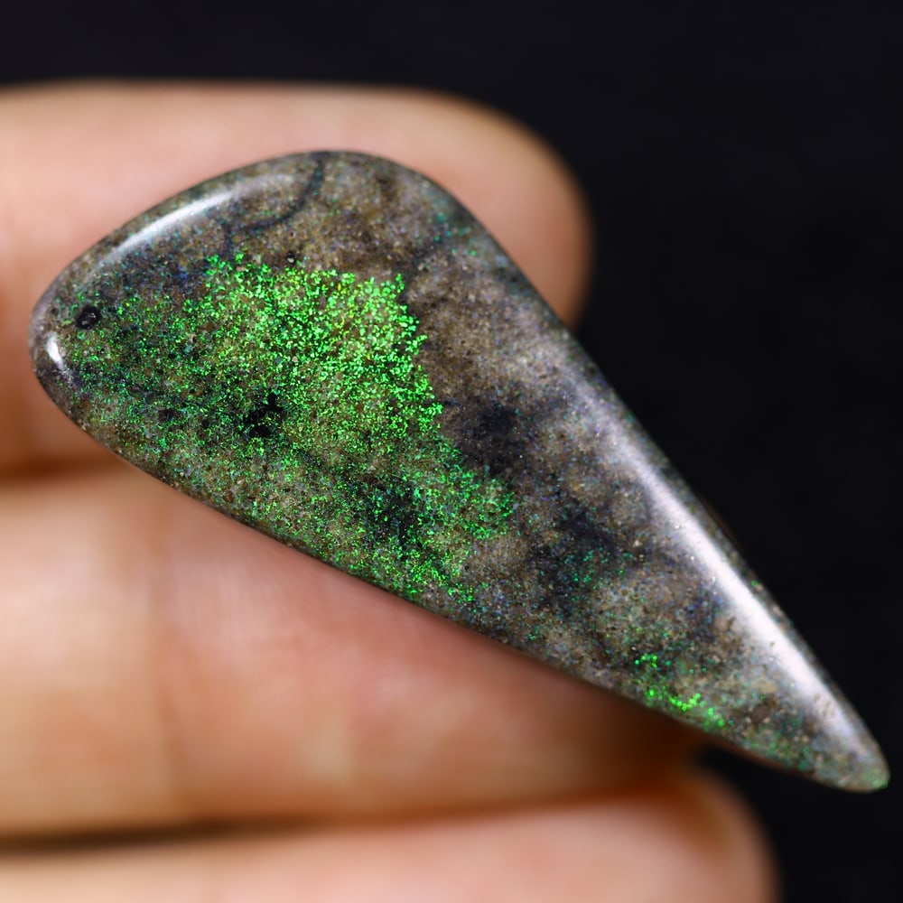 *18.98Ct Matrix Andamooka Opal - Australian Opal, 566B: Ksmith Heritage Auctioneers Subject: Natural Andamooka Opal Origin: Australia Carat Weight: 18.98Ct Dimension: 38.3x15.6x4.9 mm Treatment: Sugar Treated Type: Cabochon, Polishe