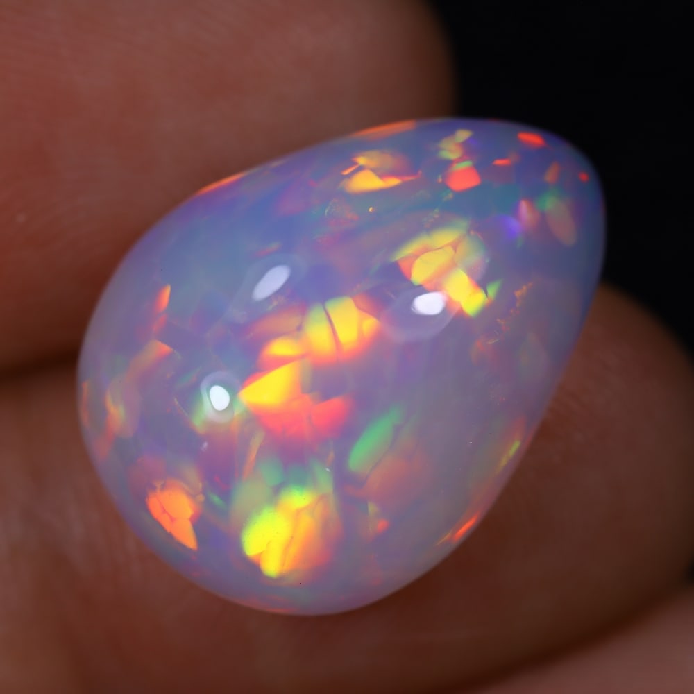 *11.65Ct Welo Opal Polished - Ethiopian Opal , 867E: Ksmith Heritage Auctioneers Subject: Natural Ethiopian Welo Opal Origin: Ethiopia Carat Weight: 11.65Ct Dimension: 20x15x8 mm Treatment: Natural Untreated Type: Cabochon, Polished