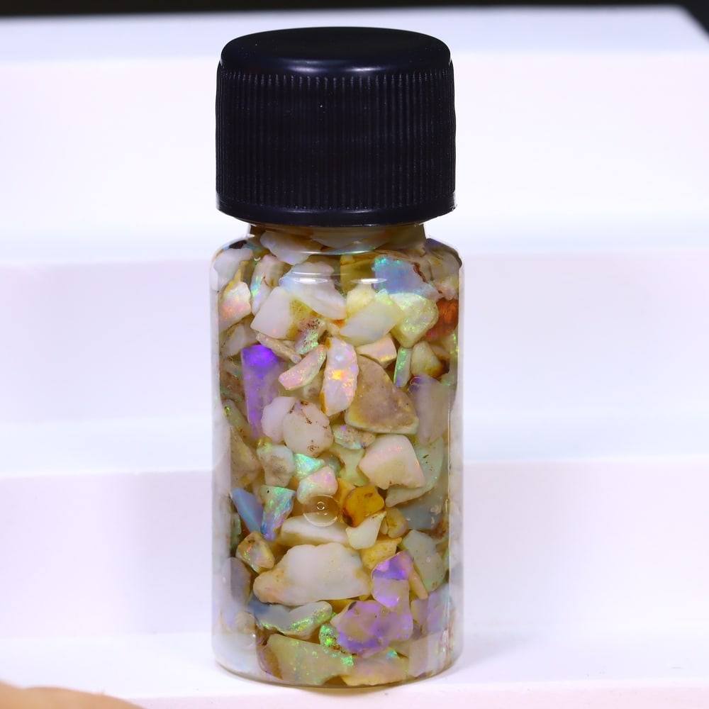 Australian Lightning Ridge Crystal Black Opal Rough Chip Jar (Good For Display), 706B: Ksmith Heritage Auctioneers Subject: Natural Australian Opal Origin: Australia Quantity: 1 Jar as photo