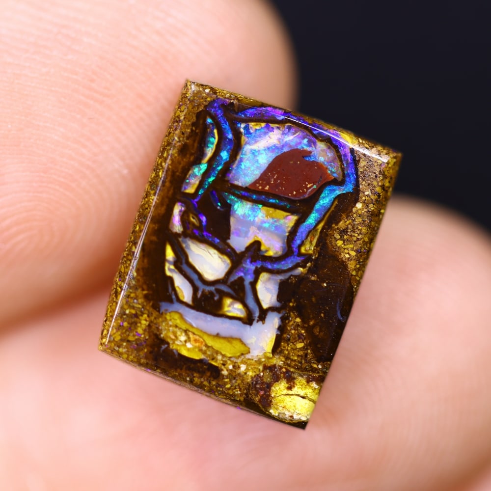 3.72Ct Boulder Opal - Australian Opal , 41E: Ksmith Heritage Auctioneers Subject: Natural Boulder Opal Origin: Australia Carat Weight: 3.72Ct Dimension: 12.9x10.2x2.7 mm Treatment: Natural Untreated Type: Cabochon, P