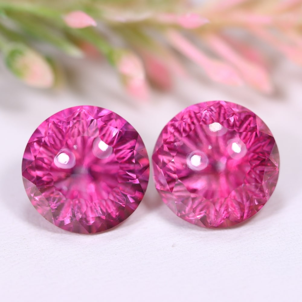 19.35Ct Special Cut Pink Topaz Pair - Polished Faceted , 925E: Ksmith Heritage Auctioneers Subject: Natural Pink Topaz Origin: Myanmar Carat Weight: 19.35Ct Dimension: 12.2x12.1x9.8 mm Treatment: Coated Type: Faceted, Polished