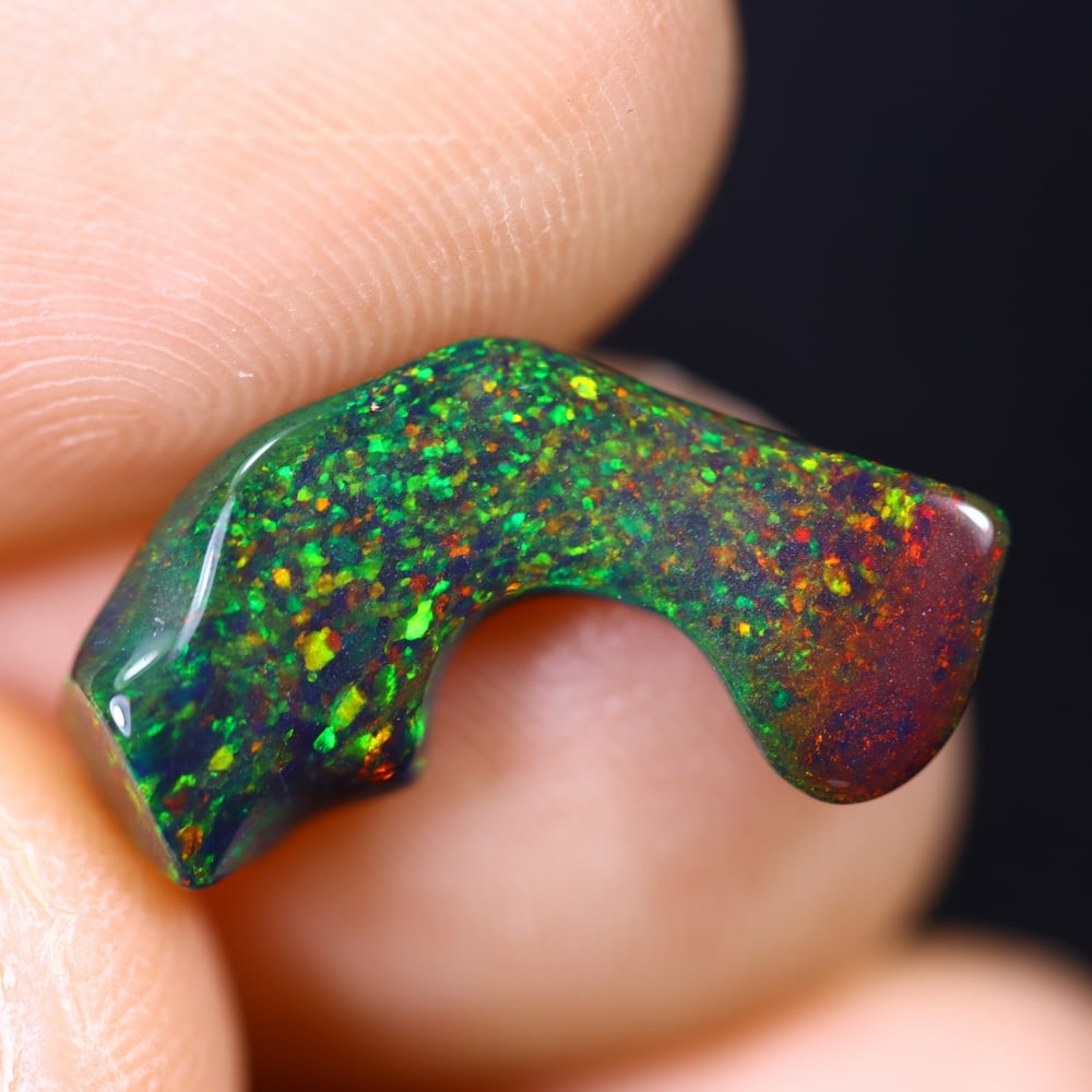 2.41Ct Natural Freeform Black Opal - 17x9x4mm - Polished Rough , 2E: Ksmith Heritage Auctioneers Subject: Natural Opal Origin: Ethiopia Treatment: Smoked Shape: Freeform Type: Polished Rough