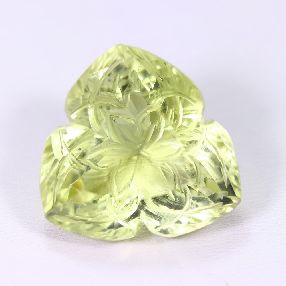 51.50Ct Lemon Carving Quartz - Polished Carving , 32E: Ksmith Heritage Auctioneers Subject: Natural Lemon Quartz Origin: Brazil Carat Weight: 51.50Ct Dimension: 25.2x24.5x16.4 mm Treatment: Untreated Type: Carving, Polished