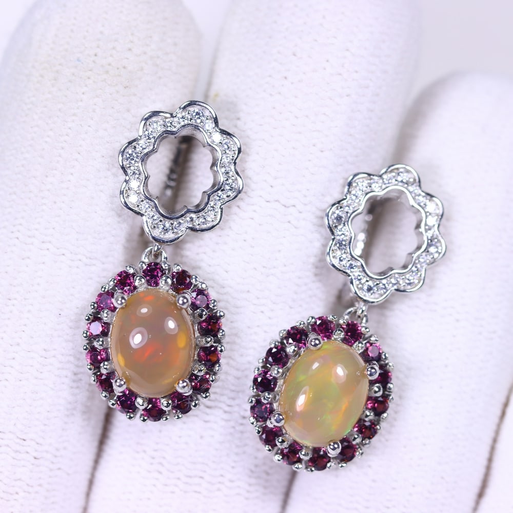 Earrings Opal, Rhodolite Garnet & Zircon - 925 Sterling Silver, 940B: Ksmith Heritage Auctioneers Subject: Natural Opal, Rhodolite Garnet & Zircon Origin: Thailand Carat Weight: 34.67ct Dimension: Gemstone 7.1x9mm Type: Earrings
