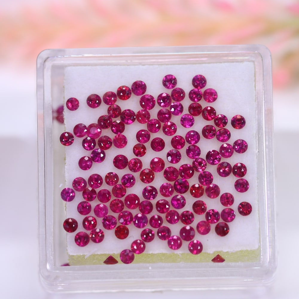 2.74Ct Heated Ruby Set - 1.6mm Round Diamond Cut , 779E: Ksmith Heritage Auctioneers Subject: Natural Ruby (Without box) Origin: Burma Dimension: 1.6x1.6x1.2 mm Treatment: Heated Shape: Round Type: Faceted, Polished