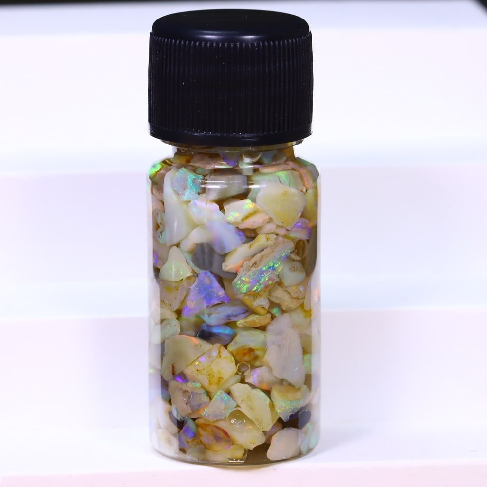 Australian Lightning Ridge Crystal Black Opal Rough Chip Jar (Good For Display), 643B: Ksmith Heritage Auctioneers Subject: Natural Australian Opal Origin: Australia Quantity: 1 Jar as photo