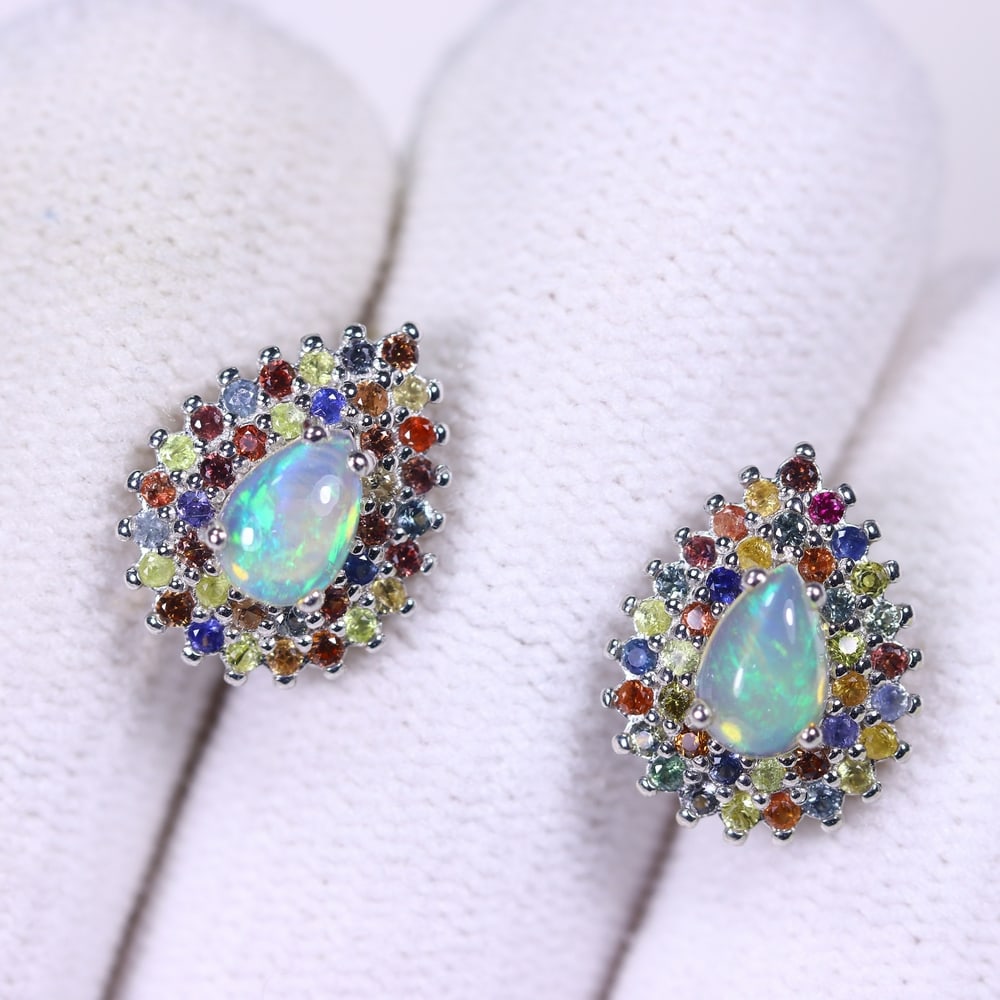 Earrings Fire Opal & Sapphire - 925 Sterling Silver , 804E: Ksmith Heritage Auctioneers Subject: Natural Fire Opal & Sapphire Diamond Cut Origin: Thailand Carat Weight: 2.13g Dimension: Gemstone 4x6mm Type: Earrings