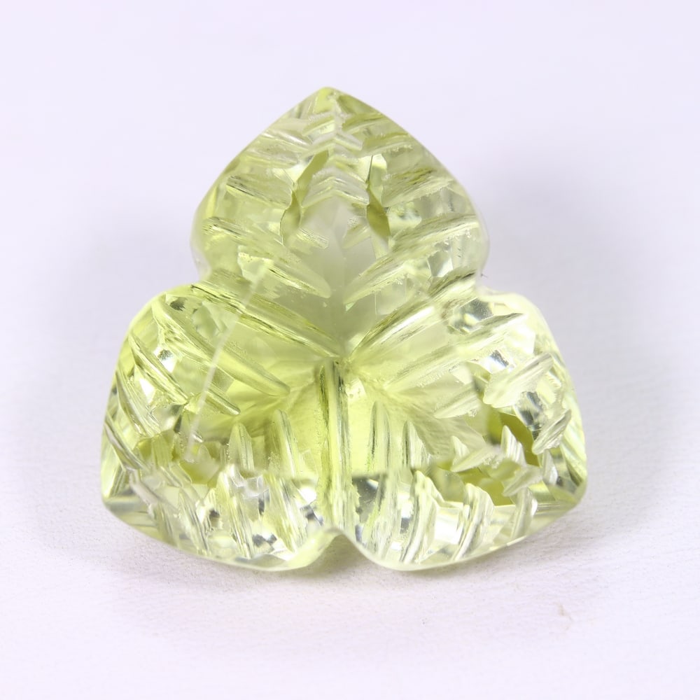 34.88Ct Lemon Carving Quartz - Polished Carving , 4E: Ksmith Heritage Auctioneers Subject: Natural Lemon Quartz Origin: Brazil Carat Weight: 34.88Ct Dimension: 22.6x21.8x13.8 mm Treatment: Untreated Type: Carving, Polished