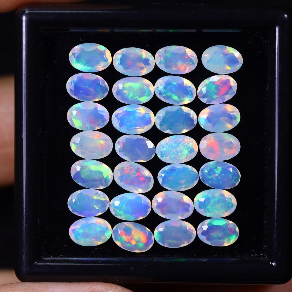 *8.22Ct 28pcs Calibrated 6x4mm Faceted Welo Opal Set - Ethiopian Opal, 853B: Ksmith Heritage Auctioneers Subject: Natural Ethiopian Welo Opal Origin: Ethiopia Carat Weight: 8.26Ct Treatment: Natural Untreated Type: Faceted, Polished