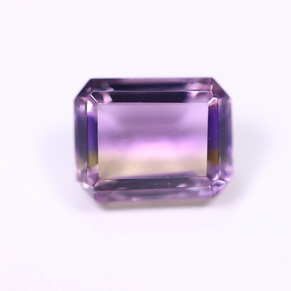 1.92Ct Ametrine - Polished Faceted - Rectangle Faceted , 792E: Ksmith Heritage Auctioneers Subject: Natural Ametrine Origin: Bolivia Carat Weight: 1.92Ct Dimension: 8 x 6.2 x 4.5 mm Treatment: Unheated Shape: Rectangle Type: