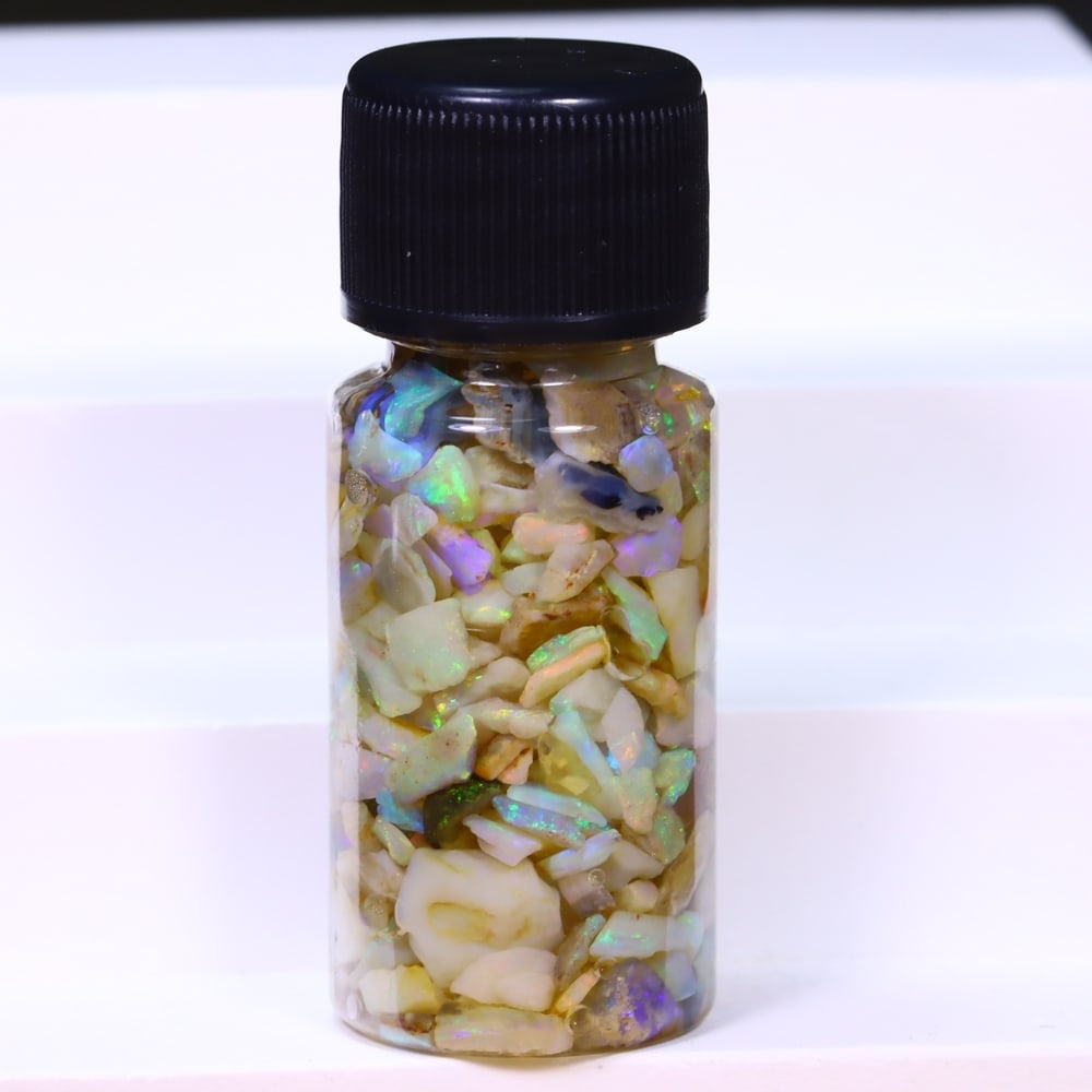 Australian Lightning Ridge Crystal Black Opal Rough Chip Jar (Good For Display), 766B: Ksmith Heritage Auctioneers Subject: Natural Australian Opal Origin: Australia Quantity: 1 Jar as photo