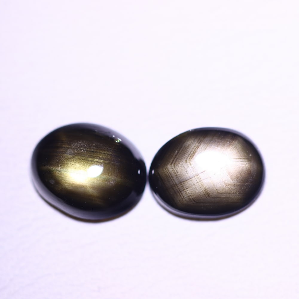 *3.03Ct 6 Rays Black Star Sapphire Set - Polished Cabochon , 776E: Ksmith Heritage Auctioneers Subject: Natural 6 Rays Star Sapphire Origin: Myanmar Carat Weight: 3.03Ct Dimension: 8x6.1x2.4 mm Treatment: Diffusion Type: Cabochon, Polishe