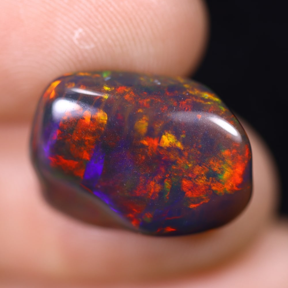6.14Ct Natural Freeform Black Opal - 17x12x6mm - Polished Rough , 66E: Ksmith Heritage Auctioneers Subject: Natural Opal Origin: Ethiopia Treatment: Smoked Shape: Freeform Type: Polished Rough