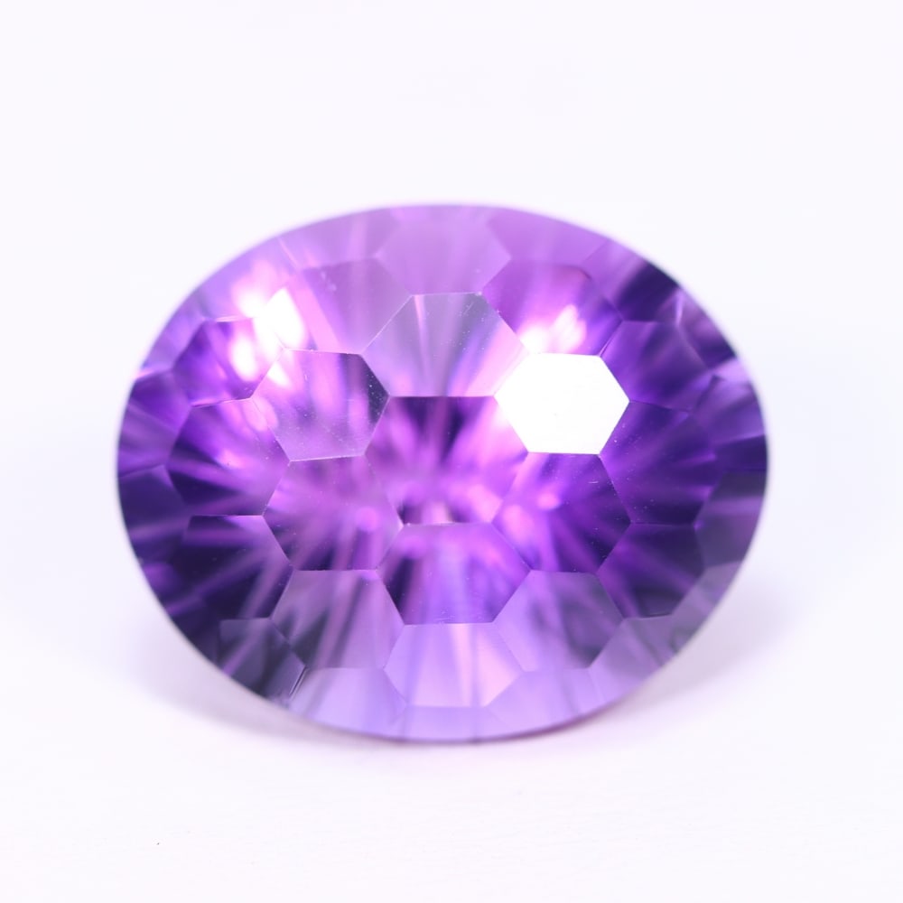 19.49Ct Purple Amethyst - Polished Faceted , 761E: Ksmith Heritage Auctioneers Subject: Natural Amethyst Origin: Brazil Carat Weight: 19.49Ct Dimension: 19.4x15.9x17.8 mm Treatment: Untreated Type: Faceted, Polished
