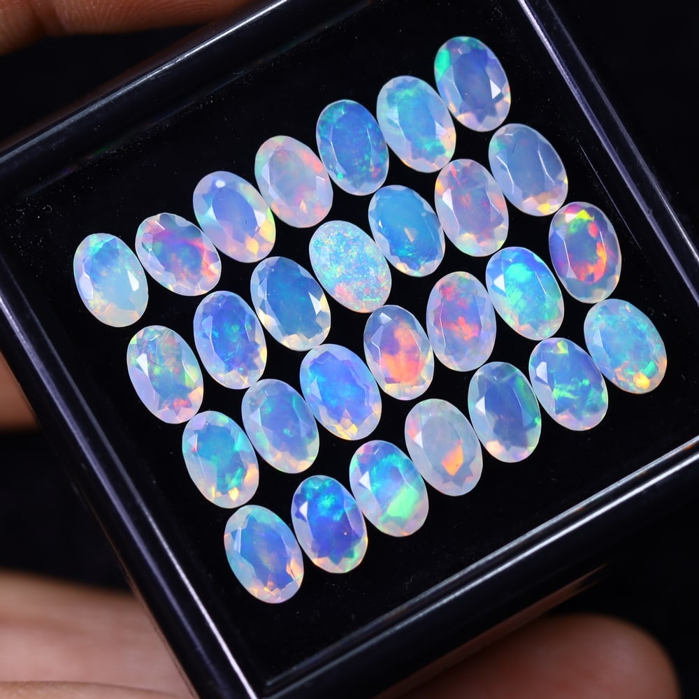 *8.60Ct 28pcs Calibrated 6x4mm Faceted Welo Opal Set - Ethiopian Opal, 807B: Ksmith Heritage Auctioneers Subject: Natural Ethiopian Welo Opal Origin: Ethiopia Carat Weight: 8.60Ct Treatment: Natural Untreated Type: Faceted, Polished