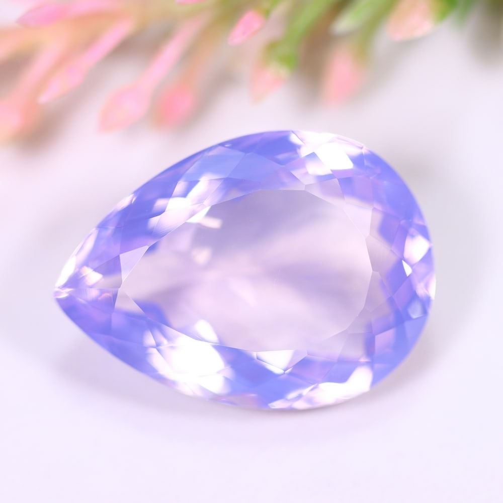 21.67Ct Lavender Amethyst - Polished Faceted , 672E: Ksmith Heritage Auctioneers Subject: Natural Lavender Amethyst Origin: Brazil Carat Weight: 21.67Ct Dimension: 23.2x16.9x9.6 mm Treatment: Untreated Type: Faceted, Polishe