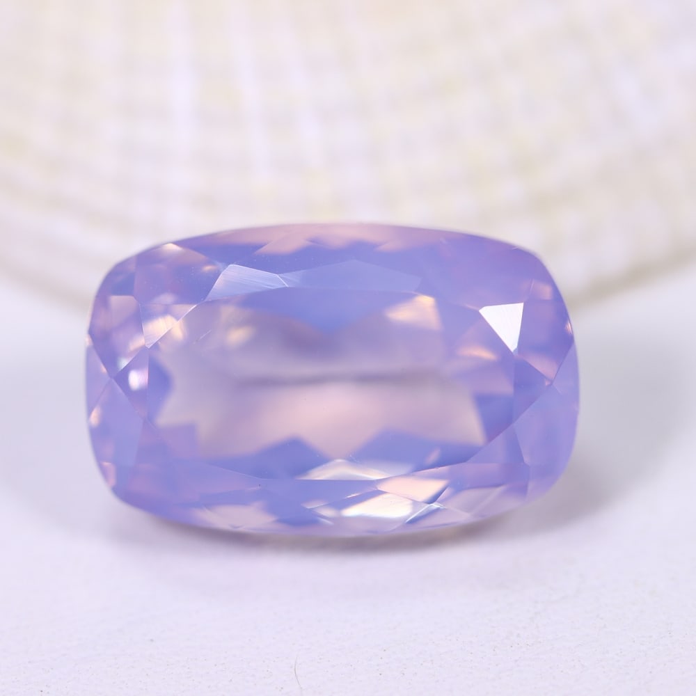 11.40Ct Lavender Amethyst - Polished Faceted , 641E: Ksmith Heritage Auctioneers Subject: Natural Lavender Amethyst Origin: Brazil Carat Weight: 11.40Ct Dimension: 16.8x10.6x9.1 mm Treatment: Untreated Type: Faceted, Polishe