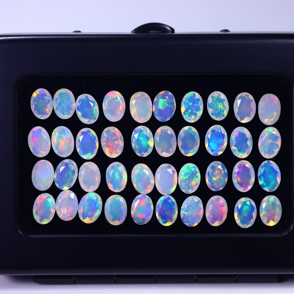 *19.74Ct Calibrated 7x5mm Faceted Welo Opal Set - Ethiopian Opal, 1120B: Ksmith Heritage Auctioneers Subject: Natural Ethiopian Welo Opal Origin: Ethiopia Carat Weight: 19.74Ct Treatment: Natural Untreated Type: Faceted, Polished