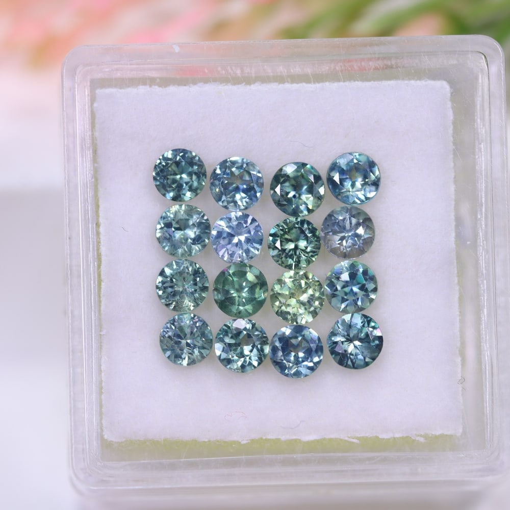 *3.07Ct 16pcs Australian Blue Sapphire Calibrated 3.4mm Set - Polished Faceted , 702E: Ksmith Heritage Auctioneers Subject: Natural Sapphire (Without box) Origin: Australia Treatment: Heated Shape: Round Type: Faceted, Diamond Cut
