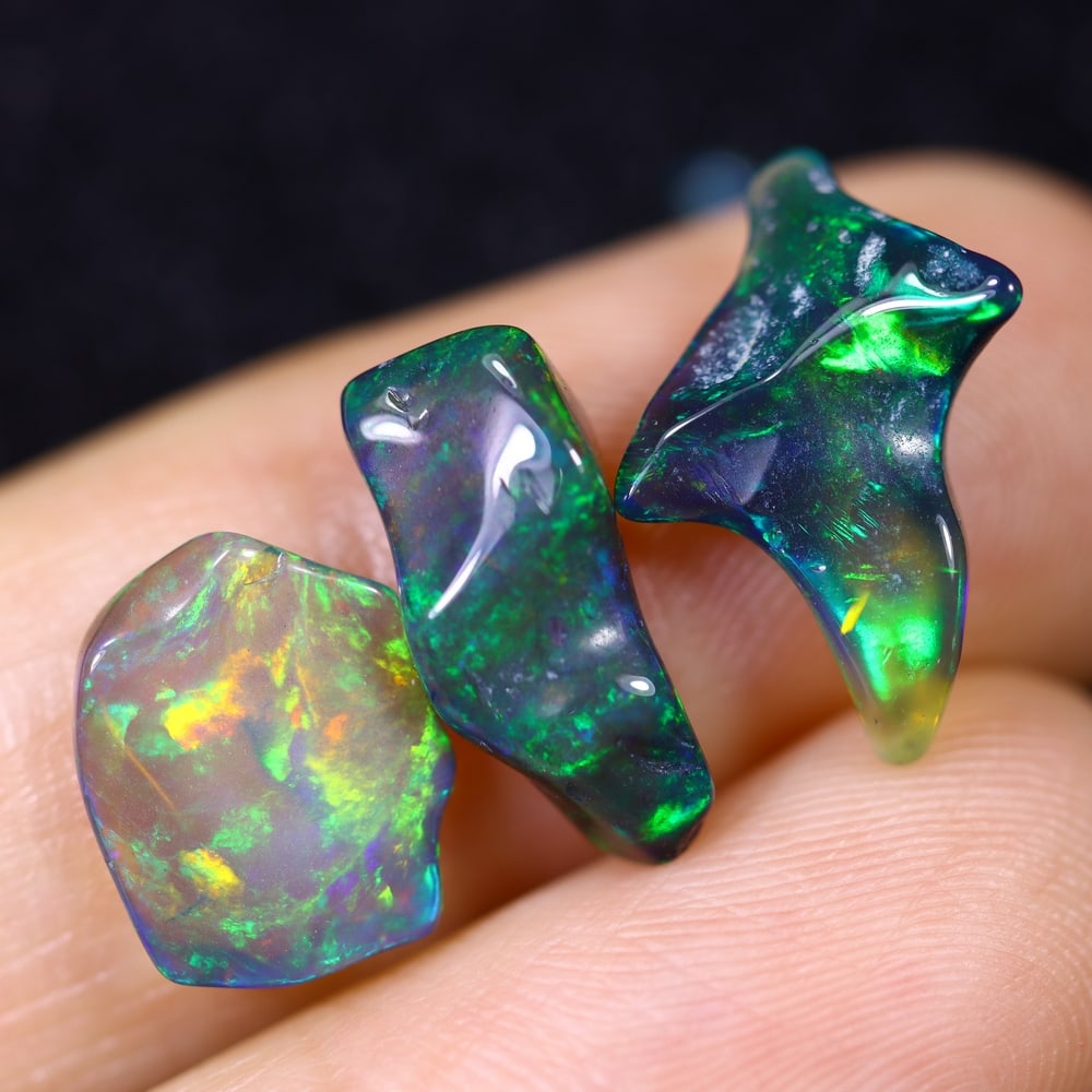 4.39Ct Natural Freeform Black Opal Set - 10x8x2mm - Polished Rough , 667E: Ksmith Heritage Auctioneers Subject: Natural Opal Origin: Ethiopia Treatment: Smoked Shape: Freeform Type: Polished Rough