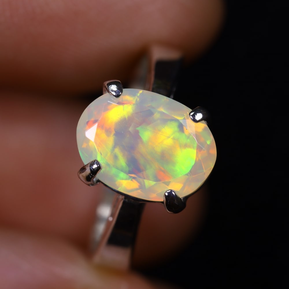 3.03g Natural Opal Stone Sterling Silver 925 Ring (Adjustable) , 586E: Ksmith Heritage Auctioneers Subject: Natural Ethiopian Opal Ring (Silver 925) Origin: Ethiopia Ring Size : Free size, Adjustable (middle size at US 6) Stone Dimension: 11x8mm Treatmen