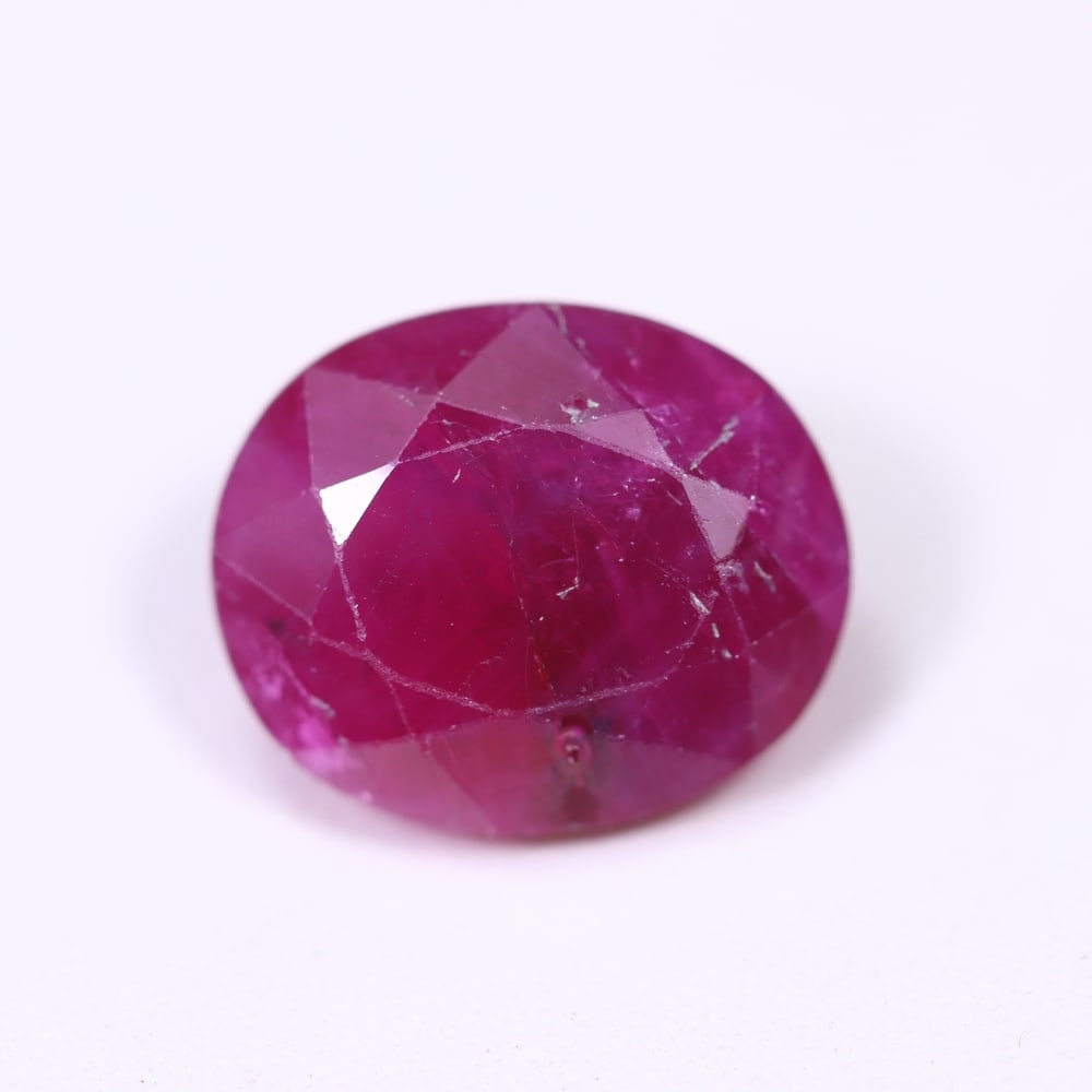 6.17Ct Red Ruby - Polished Faceted , 403E: Ksmith Heritage Auctioneers Subject: Natural Ruby Origin: Burma Carat Weight: 6.17Ct Dimension: 11.9x10x6.1 mm Treatment: Heated Type: Faceted, Polished