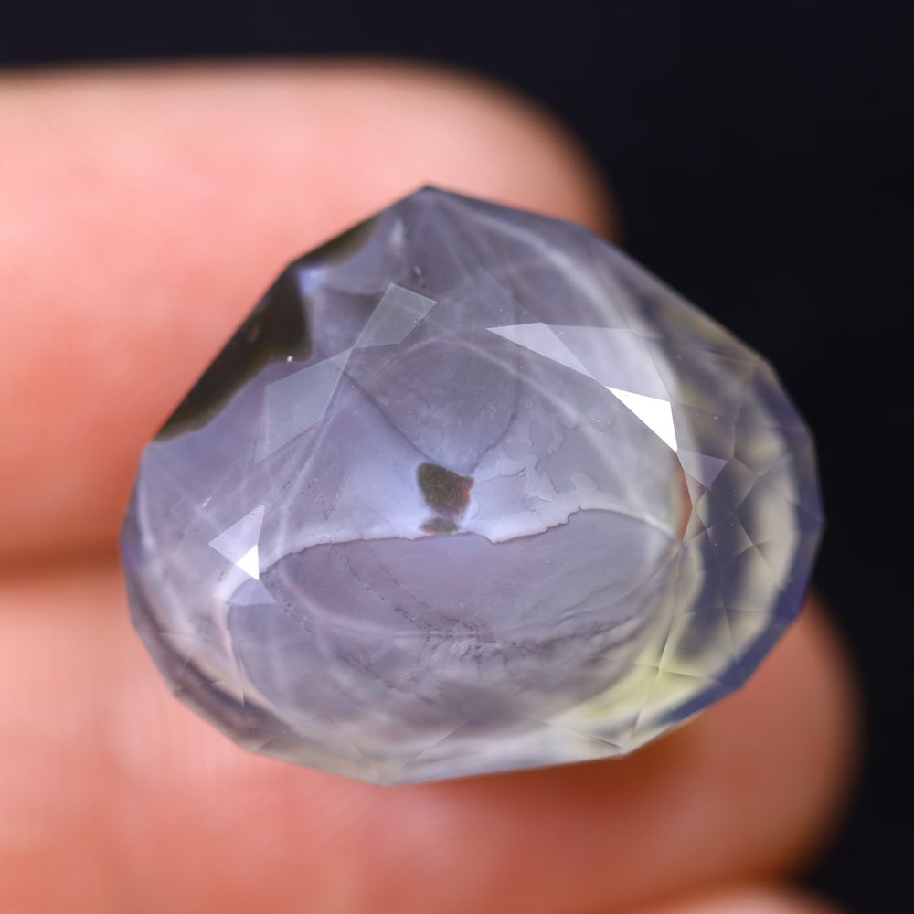 18.81Ct Faceted Crystal Opal Polished - Ethiopian Opal , 336E: Ksmith Heritage Auctioneers Subject: Natural Ethiopian Crystal Opal Origin: Ethiopia Carat Weight: 18.81Ct Dimension: 21.5x18.3x10.7 mm Treatment: Natural Untreated Type: