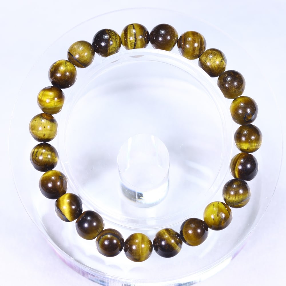 19.07g Tiger Eye Bracelet - Polished Beads , 677E: Ksmith Heritage Auctioneers Subject: Natural Tiger Eye Carat Weight: 19.07g