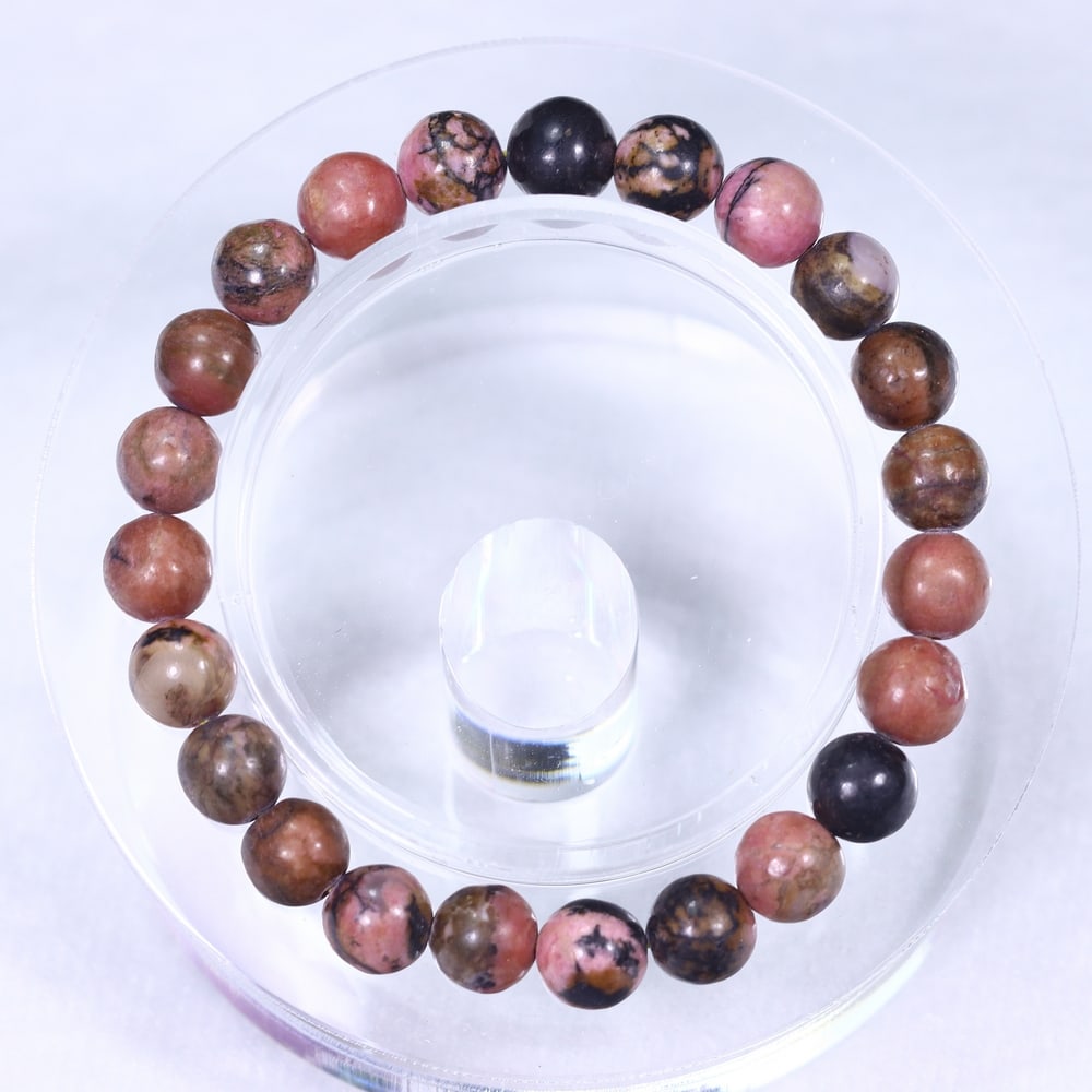 23.47g Rhodonite Bracelet - Polished Beads , 615E: Ksmith Heritage Auctioneers Subject: Natural Rhodonite Carat Weight: 23.47g