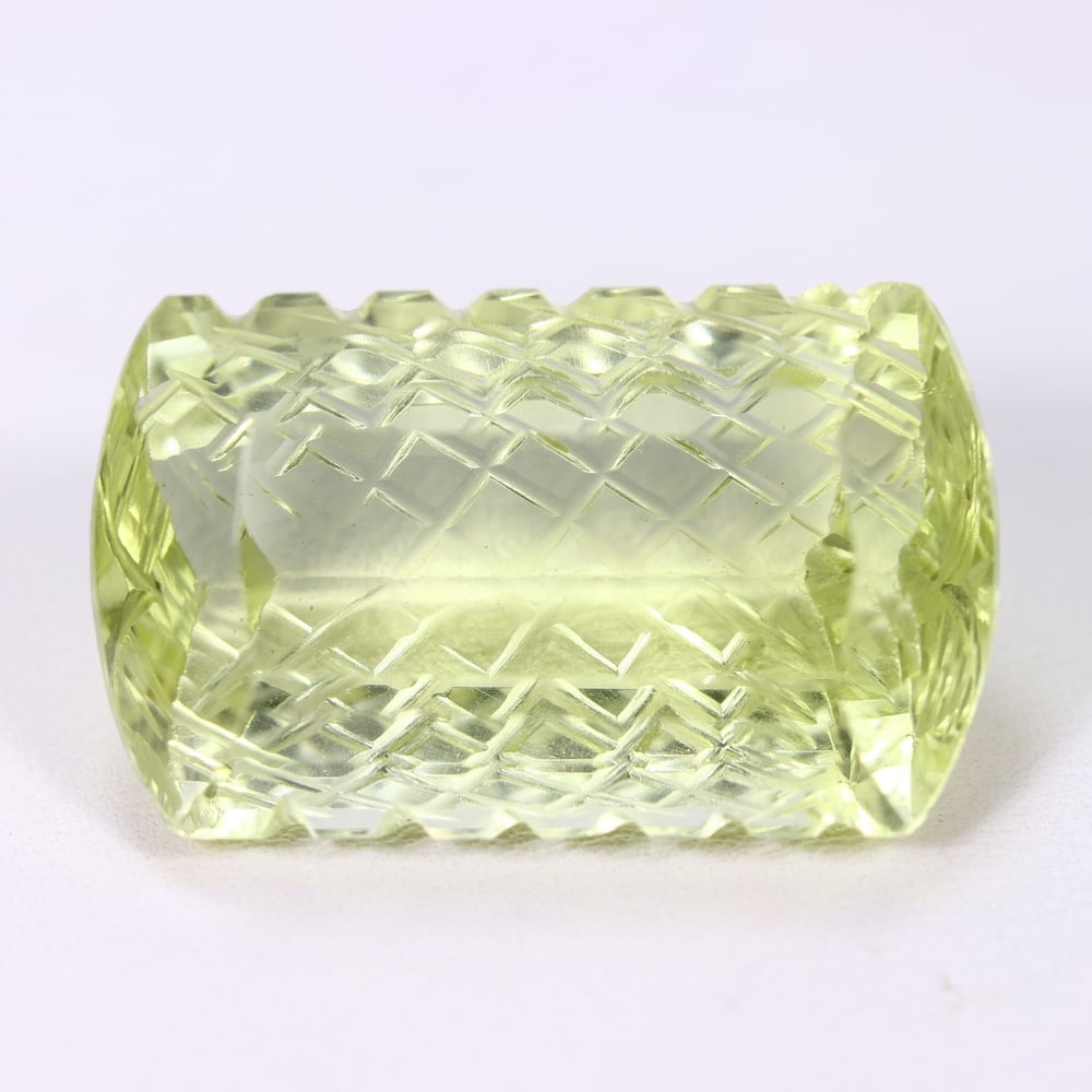39.05Ct Lemon Carving Quartz - Polished Carving , 441E: Ksmith Heritage Auctioneers Subject: Natural Lemon Quartz Origin: Brazil Carat Weight: 39.05Ct Dimension: 26.8x16.3x11.9 mm Treatment: Untreated Type: Carving, Polished